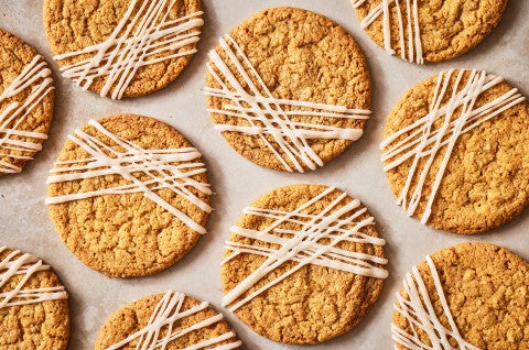 Crispy Brown Butter Cookies seen from above evenly spaced on a counter - select to zoom