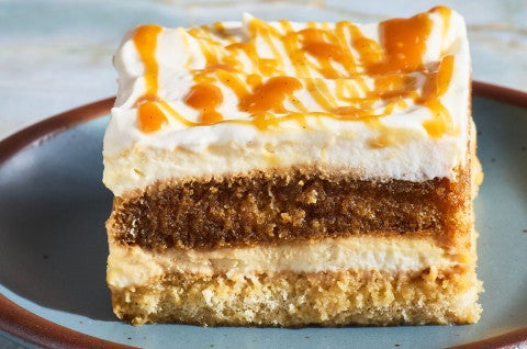 Side view of layered Caramel Macchiato Tiramisu on a plate - select to zoom
