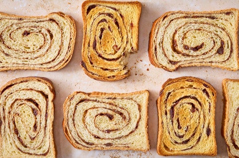 Sourdough Cinnamon Swirl Bread arranged on a counter seen from above - select to zoom