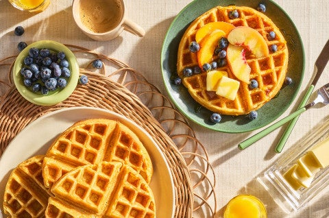 Classic Buttermilk Waffles arranged on a table seen from above. - select to zoom