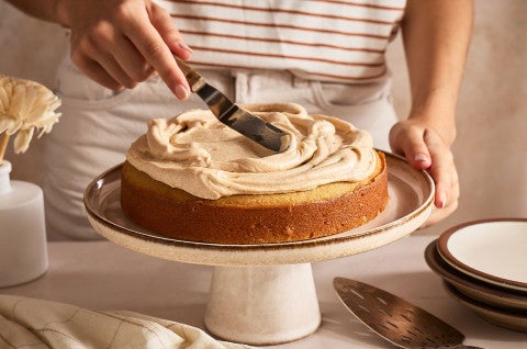 Spreading frosting on Frosted Brown Butter Cake - select to zoom