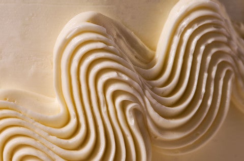 Swirled Italian Buttercream on the outside of a cake - select to zoom