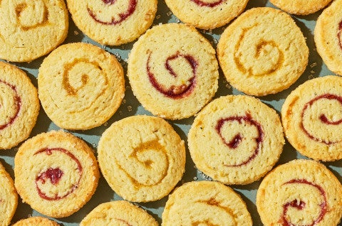 Any-Jam Pinwheel Cookies arranged tight together and seen from above - select to zoom