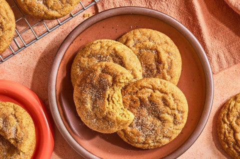 Pumpkin Snickerdoodle Cookies arranged on a plate and seen from above - select to zoom