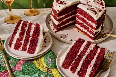 Slices of layered Red Velvet Cake on plates - select to zoom