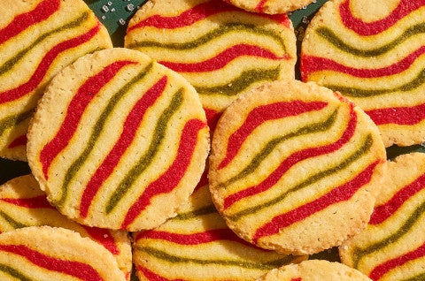 Ribboned Peppermint Shortbread Cookies stacked and arranged seen from above - select to zoom