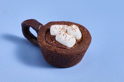 A Hot Cocoa Cookie Cup on a blue counter - select to zoom