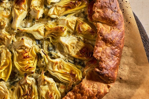 A detailed shot of Spinach Artichoke Galette - select to zoom