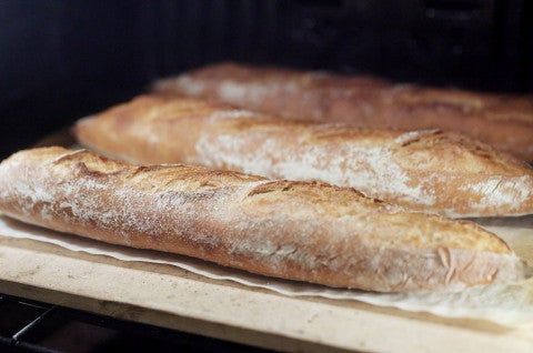 Baker's Reserve Baguettes coming out of the oven - select to zoom