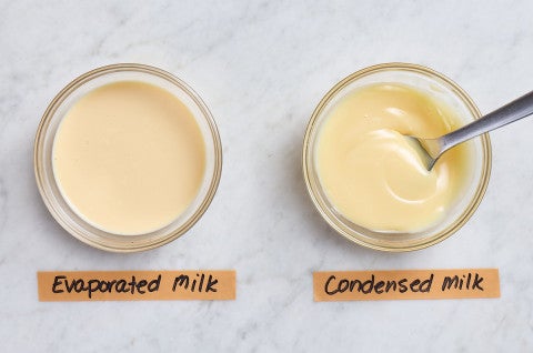 Bowl of evaporated milk next to a bowl of condensed milk 
