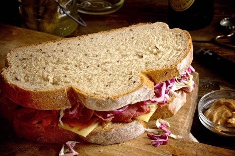 Two slices of caraway rye bread turned into a sandwich, one King Arthur's many rye bread recipes. - select to zoom