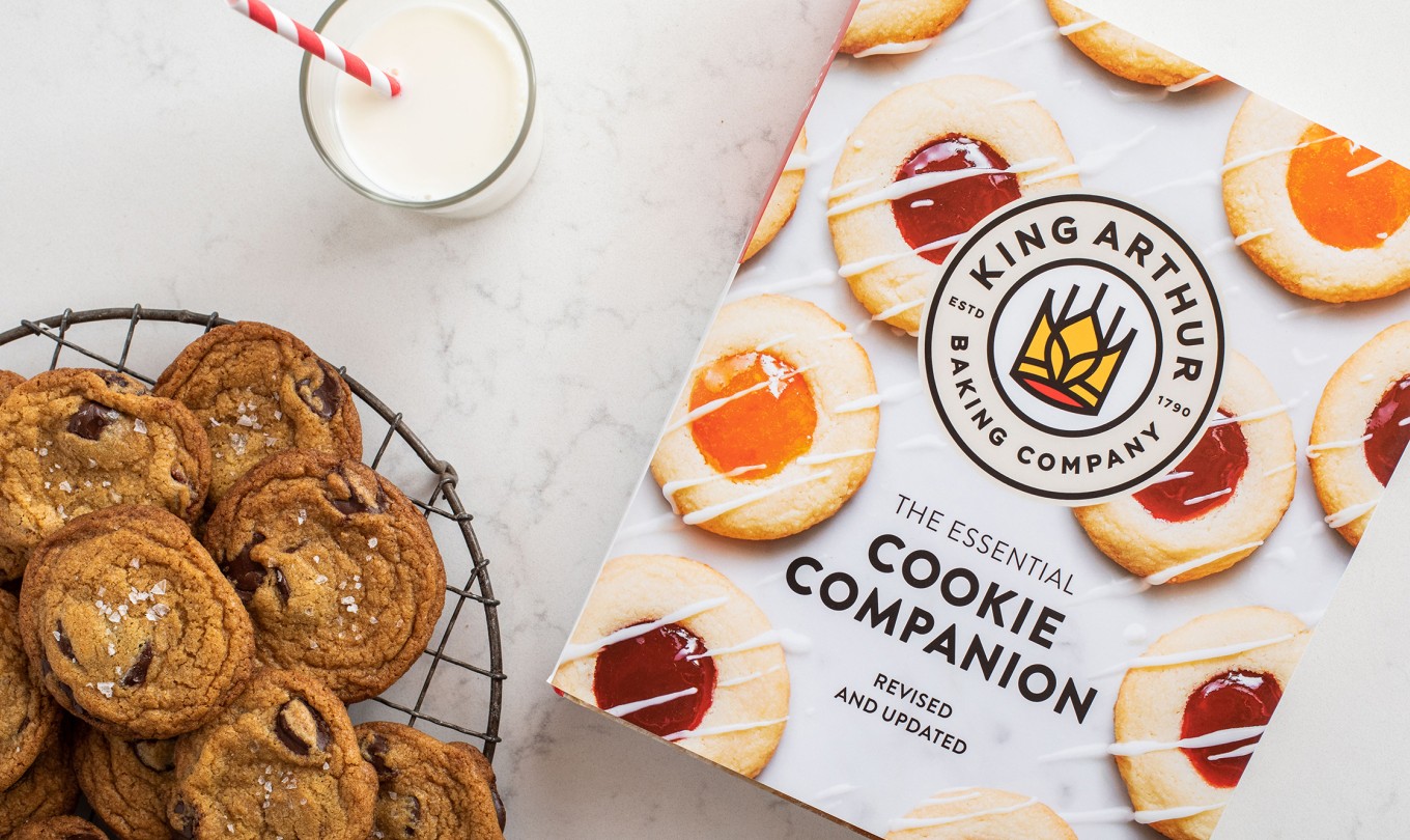 The Essential Cookie Companion with a plate of cookies