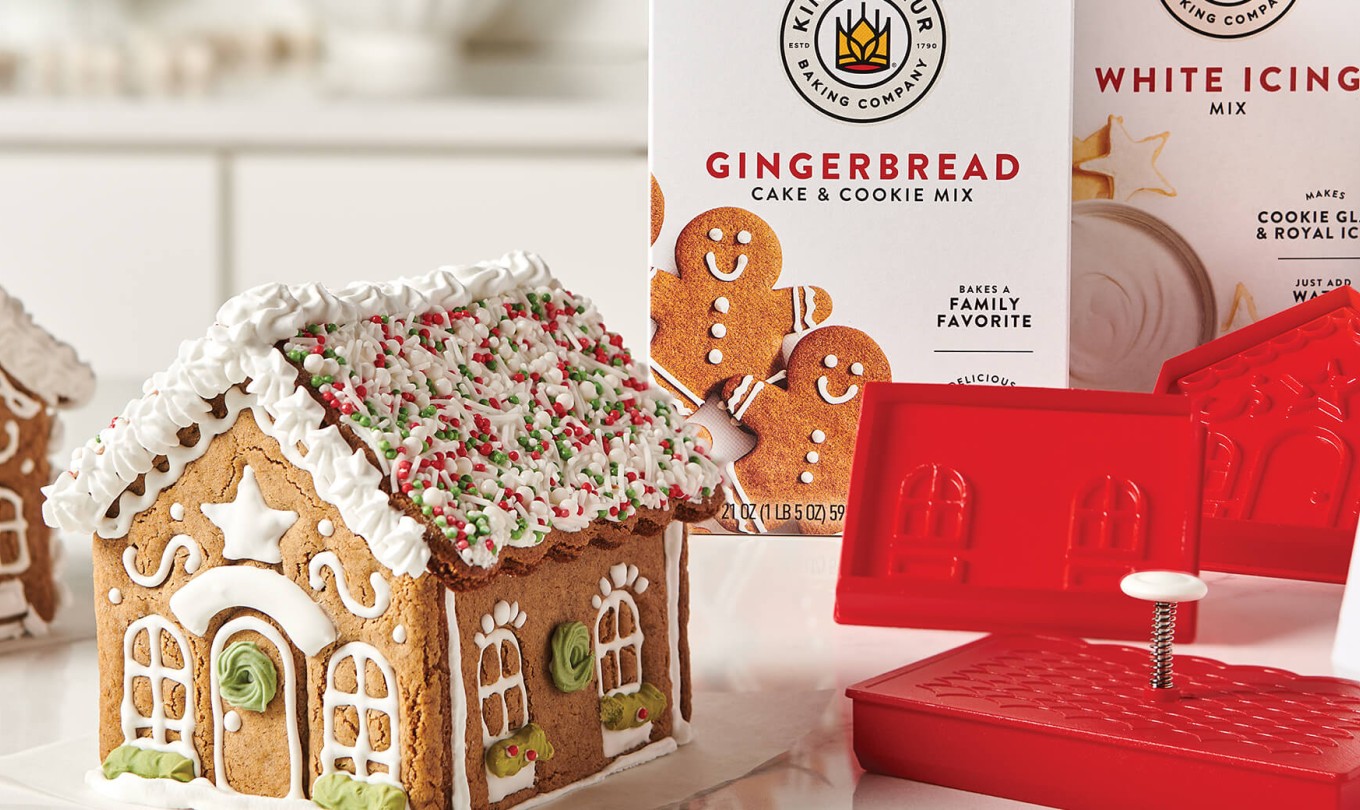 A gingerbread house kit and finished houses