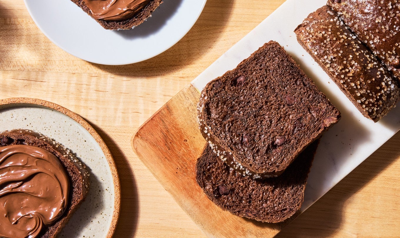Chocolate Milk Bread sliced, some with Chocolate-Hazelnut spread