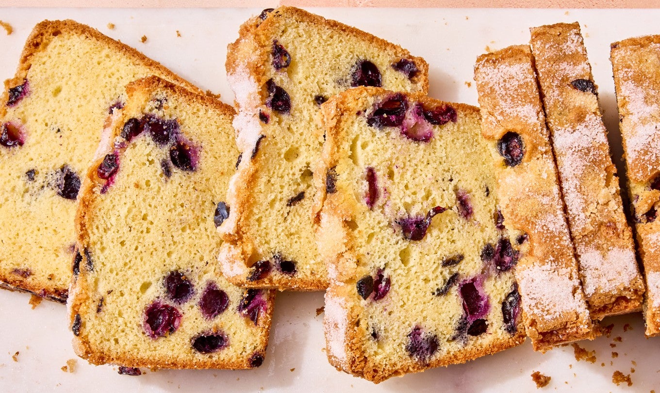 Blueberry Bread sliced on a cutting board