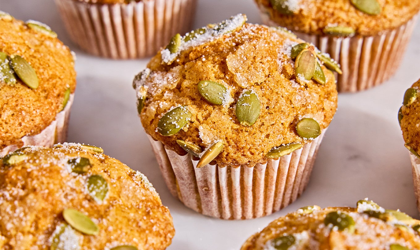 A bunch of Easy Pumpkin Muffins on a table