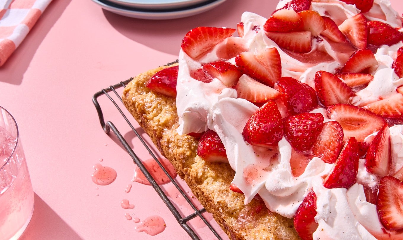 Giant Strawberry Shortcake on a cooling rack