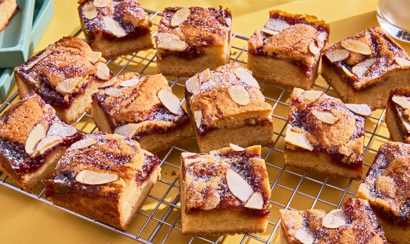 Raspberry Frangipane Bars sliced on a cooling rack