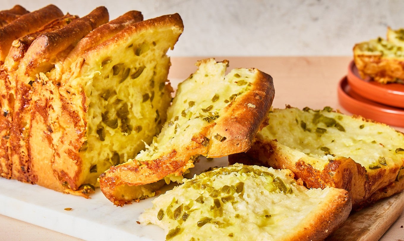 Jalapeño-Cheddar Pull-Apart Bread with a few pieces pulled off
