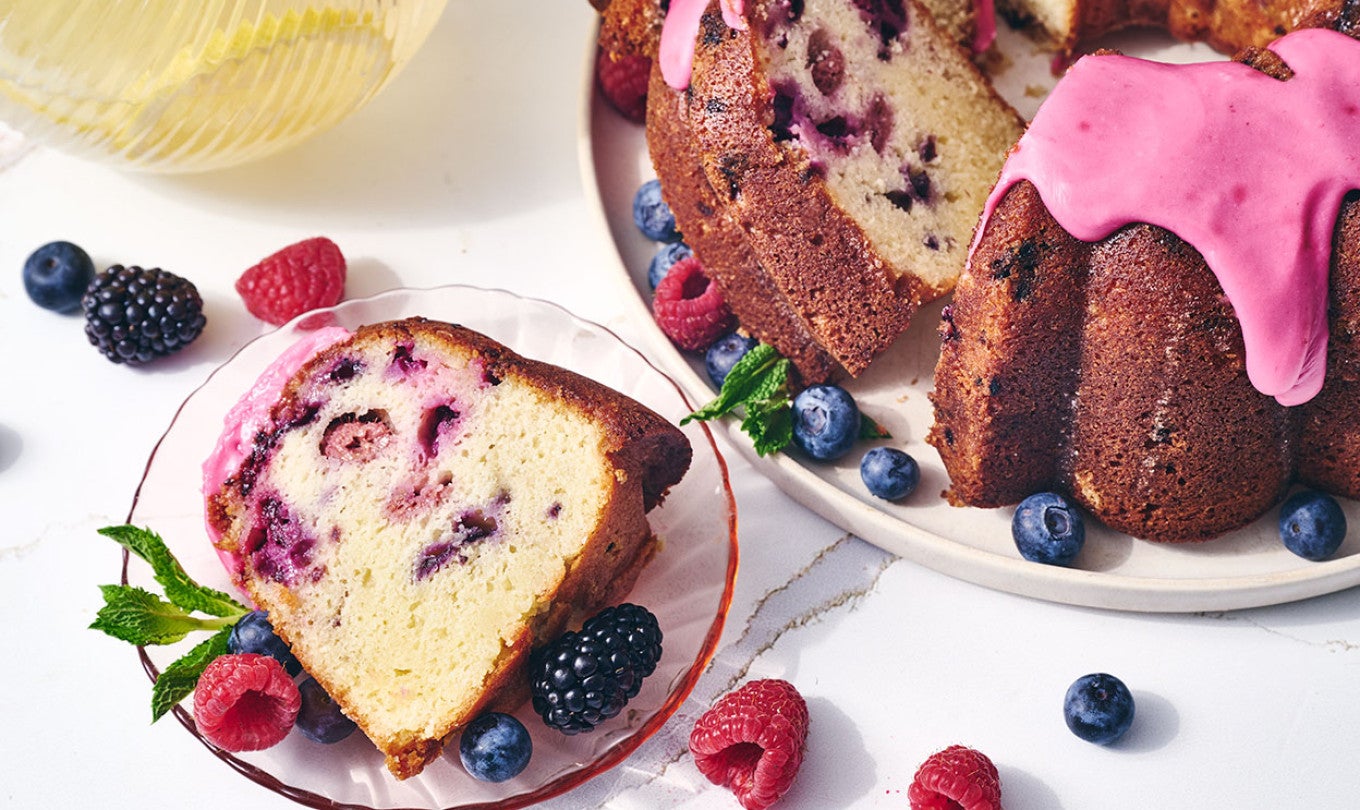 Berry Bliss Bundt Cake sliced on a plate