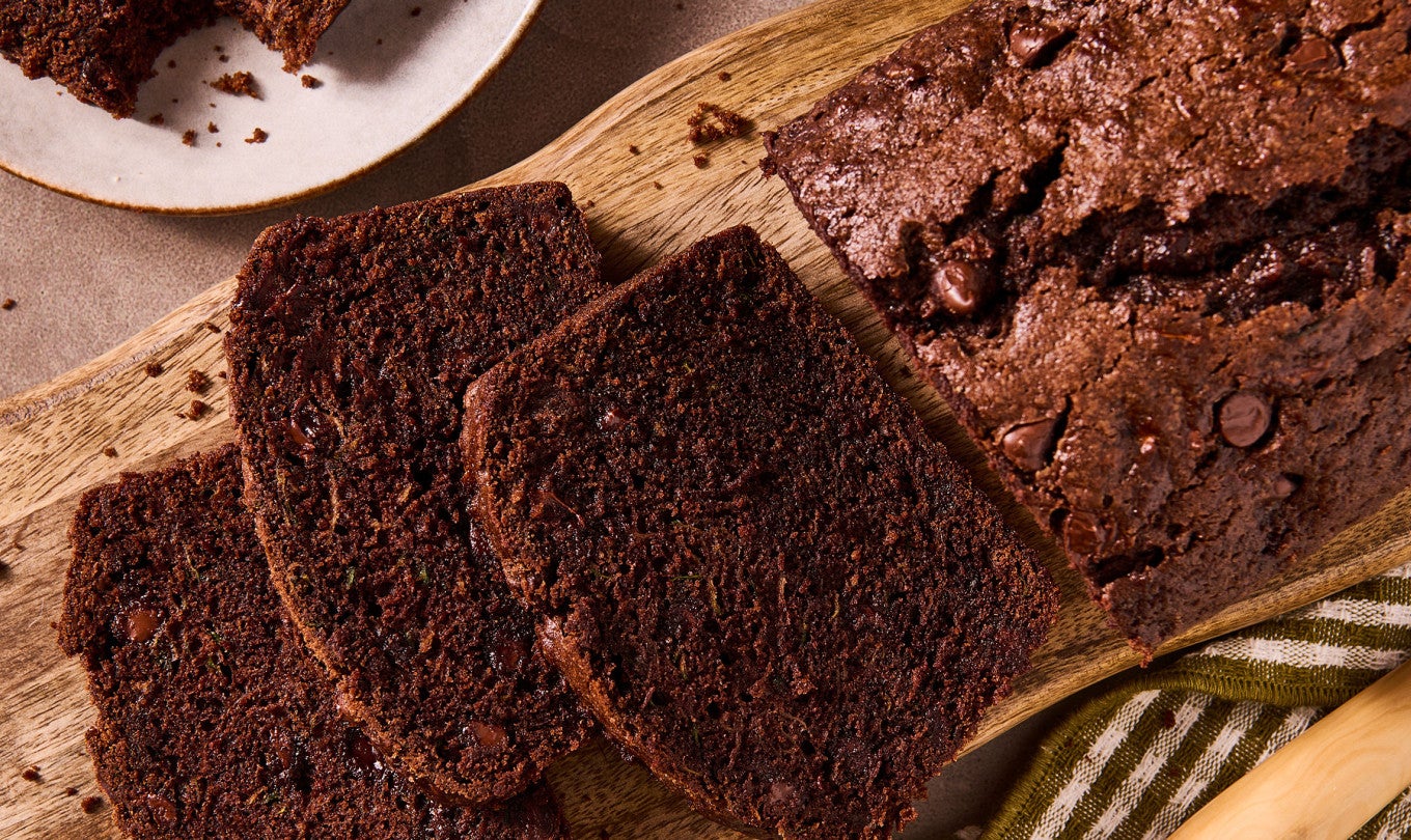 Double Chocolate Zucchini Bread sliced on a cutting board