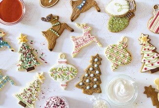 Christmas-themed cookies decorated with naturally colored icing