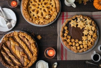 Three custard pies with top crusts: chocolate cream, pumpkin pie, lemon chess pie