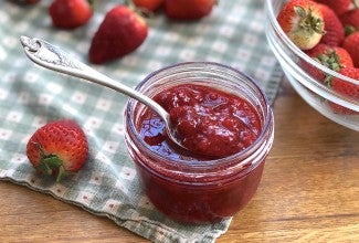 Jar of fresh strawberry preserves