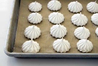 Aquafaba meringues on a baking sheet