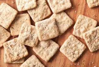 Sourdough crackers on a wooden board