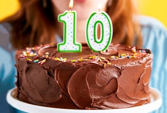 A chocolate cake with a number 10 candle in the top
