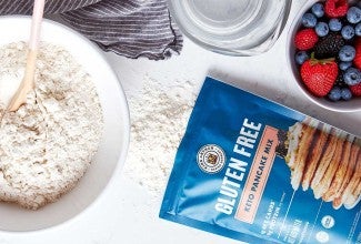 Keto pancake mix next to prep bowls on counter