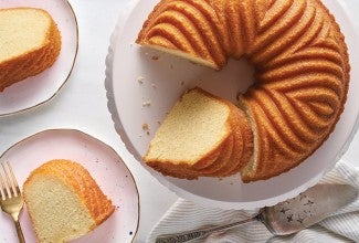 Bundt cake with several slices cut