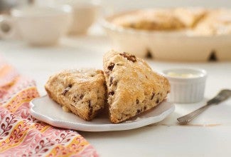 Two cherry scones on a plate