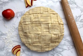 Unbaked apple pie with quilt design