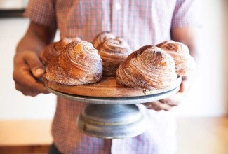 Jason holding tray of morning buns