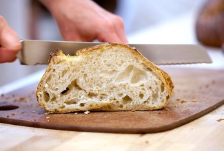 sourdough bread being sliced