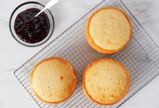 6" cakes on a cooling rack