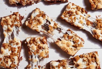 S'more granola bars pulled apart to show melted marshmallow