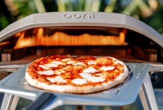 Pizza baking in Ooni oven