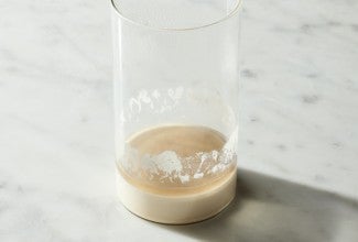 Starter with dark liquid