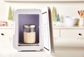 A jar of active starter in the Sourdough Home