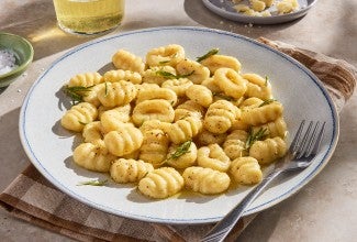 Potato Gnocchi on a plate with a fork
