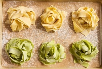 Sourdough Pasta nests on a sheet of parchment