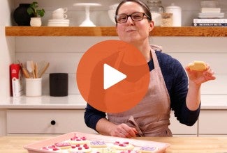Play button for Cookie Designs videos - select to zoom