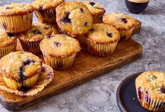Lemon Blueberry Muffins on a cutting board