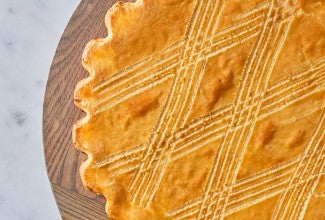 Broyé Du Poitou shortbread from above with scoring across the top.