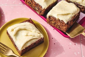 Tomato Soup Spice Cake sliced and shown on a plate.