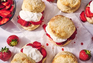 Strawberry Shortcake seen from above on a table cloth