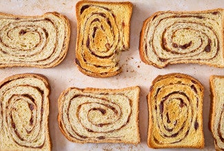Sourdough Cinnamon Swirl Bread arranged on a counter seen from above